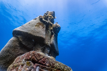 Fototapeta na wymiar Underwater grotto of the holy child Jesus.