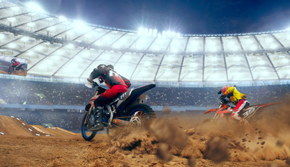 Motocross riders in action. Supercross. Motocross sport. © Artur Didyk
