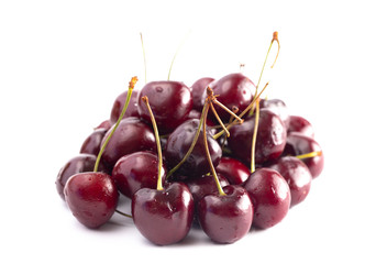 Fresh Dark Red Cherries with Stems on a White Background