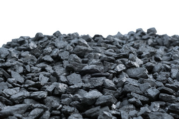 The texture of coal on a white background. Mining of coal. Hardened wood. Natural black coals for background, coal industry. 