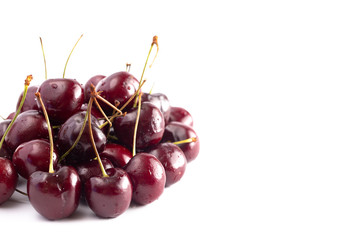 Fresh Dark Red Cherries with Stems on a White Background