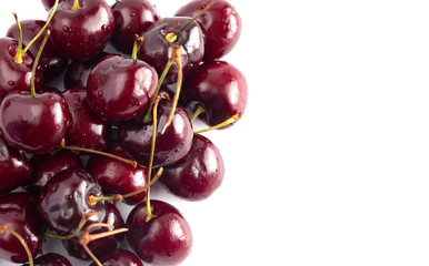Fresh Dark Red Cherries with Stems on a White Background