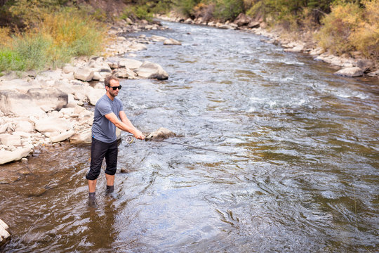 San Miguel River, near Telluride, Colorado, USA: A male fly fisher.
