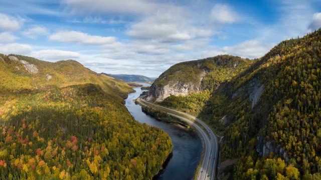 Aerial panoramic view of a scenic road during a vibrant sunny day. Taken near Corner Brook, Newfoundland, Canada. Still Image Continuous Animation
