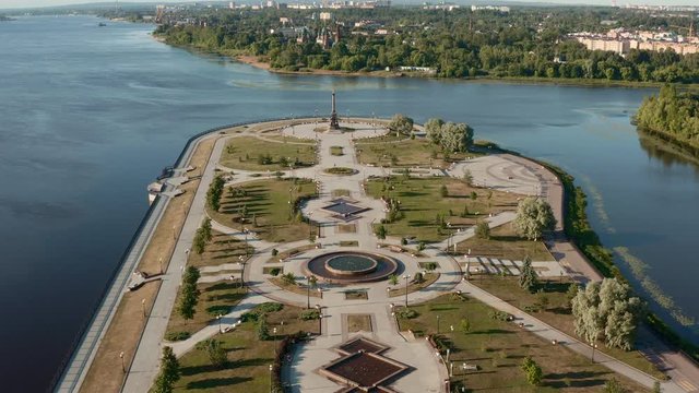 Scenic aerial view of famous Strelka park in place of confluence of Kotorosl and Volga rivers in ancient touristic historic town Yaroslavl in Russian Federation. Beautiful summer sunny look of park
