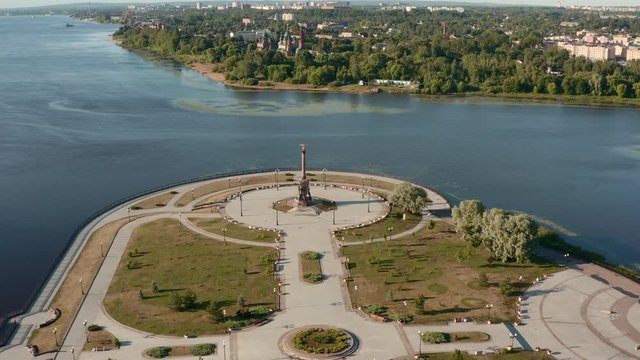 Scenic aerial view of famous Strelka park in place of confluence of Kotorosl and Volga rivers in ancient touristic historic town Yaroslavl in Russian Federation. Beautiful summer sunny look of park