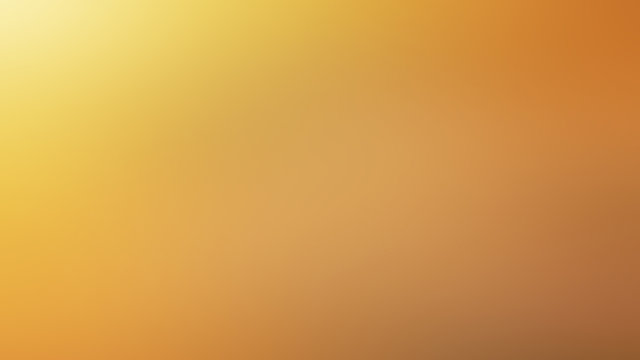 gradient abstract blurred ocher background.