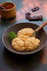 Serbian salad called Urnebes of cheese and chili peppers, paprika powder, chopped peppers and dry peppers (aleva). Traditional Serbian appetizer. Serbian cuisine