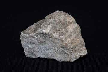 Piece of hard ground rock of Manhattan granite bed rock