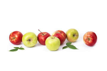 Red and green apples on a white background. Green and red juicy apples with green leaves on an isolated background. A group of ripe apples on a white background.