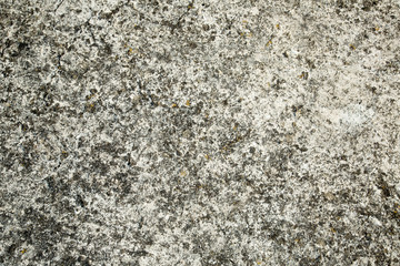 Gray texture of old stone. Close-up