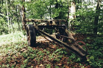 old tractor trailer in the forest 