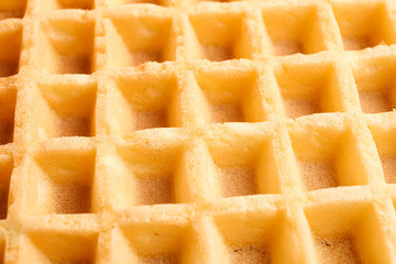 Belgian waffles texture as background, closeup