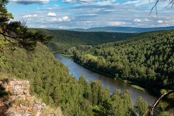Fototapeta na wymiar landscape of a mountain river and wild forest from a bird's eye view