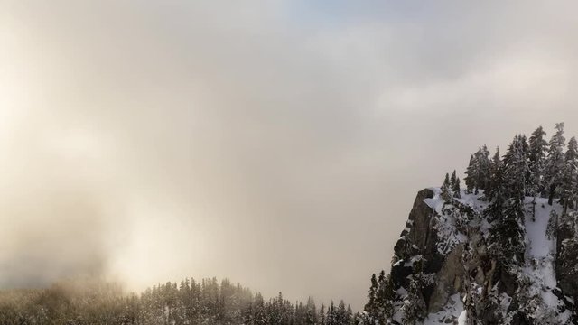 Cinemagraph of a Beautiful view on top of a mountain during a vibrant evening before sunset. Taken on St Mark's Peak, North of Vancouver, British Columbia, Canada. Still Image Continuous Animation