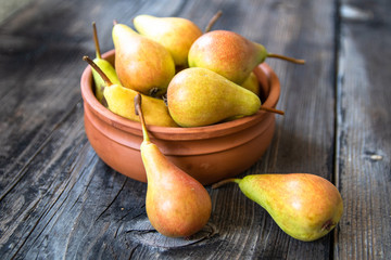 Fresh organic pears on a old wooden table