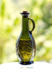 olive oil in olive embossed bottle