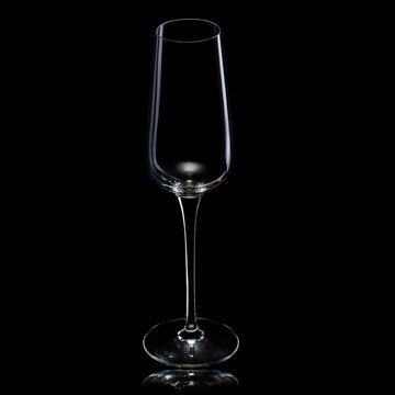 Empty luxury champagne glass isolated on a black background