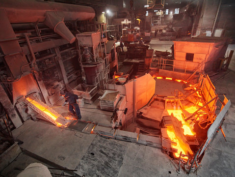 Industry, Workers controlling smelting process