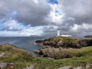 Fototapeta na wymiar Lighthouse on a cliff
