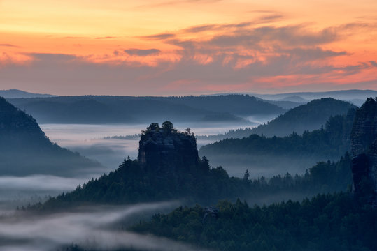 View of Elbe Sandstone Mountains against cloudy sky