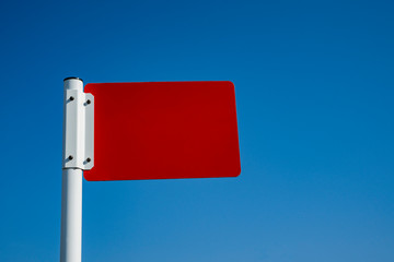 Information pointer on a single support. The screen is red.  There is no inscription on the screen....