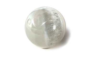 Beautiful white selenite sphere, cut mineral on white background, isolated