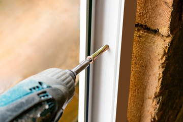Work with a screwdriver when installing the window