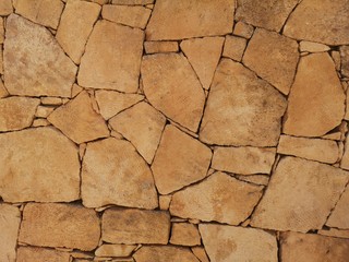 brown stone wall texture, abstract background, pattern of nature stone wall