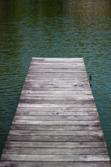 Obraz premium wooden scaffolding on the nature above the lake water