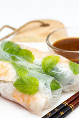 Homemade Vietnamese rolls with sauce.