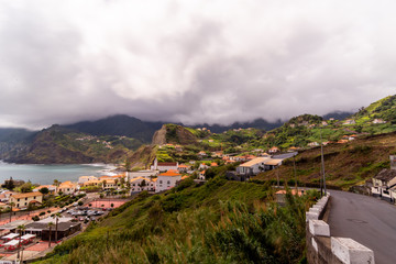 Fototapeta na wymiar Seascape leading line to some city in Madeira and coastline