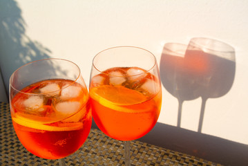 Aperol spritz with white background under sun shine