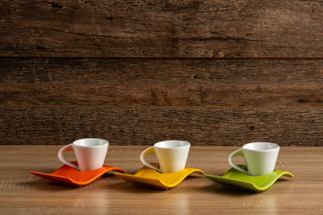 Three simple cups of coffee, side view