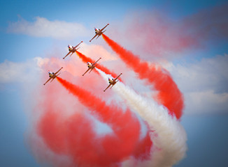 red airplane in the sky