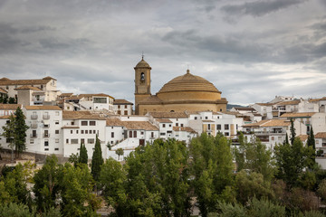 Fototapeta na wymiar a view of Montefrio town and the Church of the Incarnation, province of Granada, Andalusia, Spain
