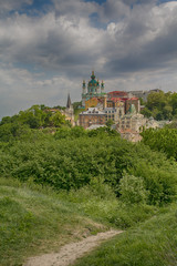 Beautiful view of the ancient street Andrew's Descent and the St. Andrew's Church. Kiev, Ukraine