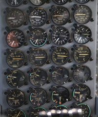 Details with the dials in the cockpit of a military cargo airplane.