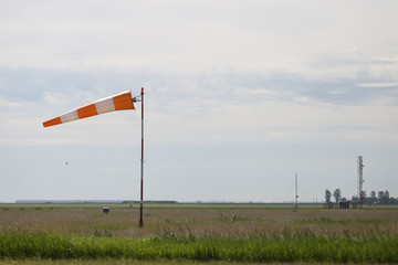 Details with a wind direction indicator on an airport