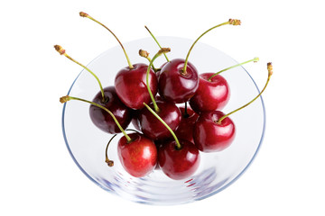 Cherry in a glass isolated on a white background	