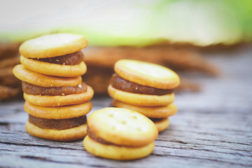 Homemade cookies with jam pineapple - biscuits cookies on wooden for snack cracker