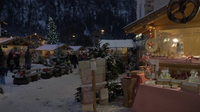Christmas Market in Campitello di Fassa at dusk, Campitello di Fassa, Province of Trento, Italy, Europe