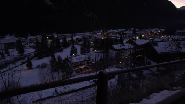 View of Campitello di Fassa and mountains at dusk in winter, Province of Trento, Italian Dolomites, Italy, Europe