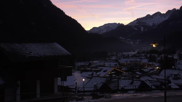 View of Campitello di Fassa and mountains at dusk in winter, Province of Trento, Italian Dolomites, Italy, Europe