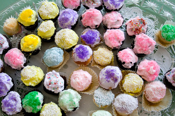 Fancy colorful cupcake treats served at the Swedish Institute for Midsommar Celebration. Minneapolis Minnesota MN USA