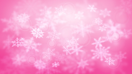 Christmas blurred background of complex defocused big and small falling snowflakes in pink colors with bokeh effect