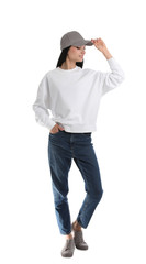 Fototapeta premium Full length portrait of young woman in sweater isolated on white. Mock up for design