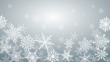 Christmas background with various complex big and small snowflakes in gray colors