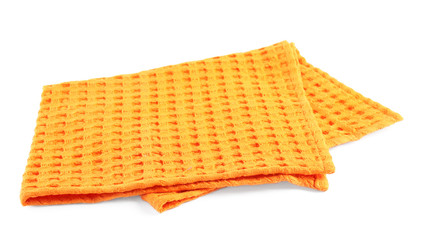 Folded orange kitchen towel on white background