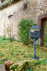 A vintage letter box in the countryside of Bourgogne, France.